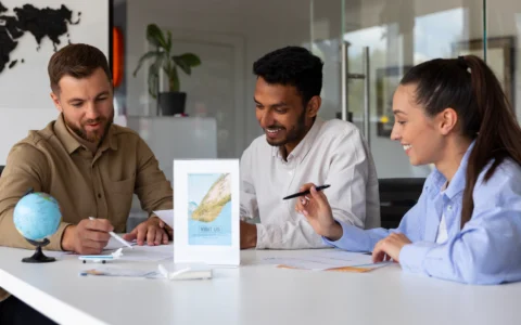Entrepreneur shaking hands with buyer after successful business sale