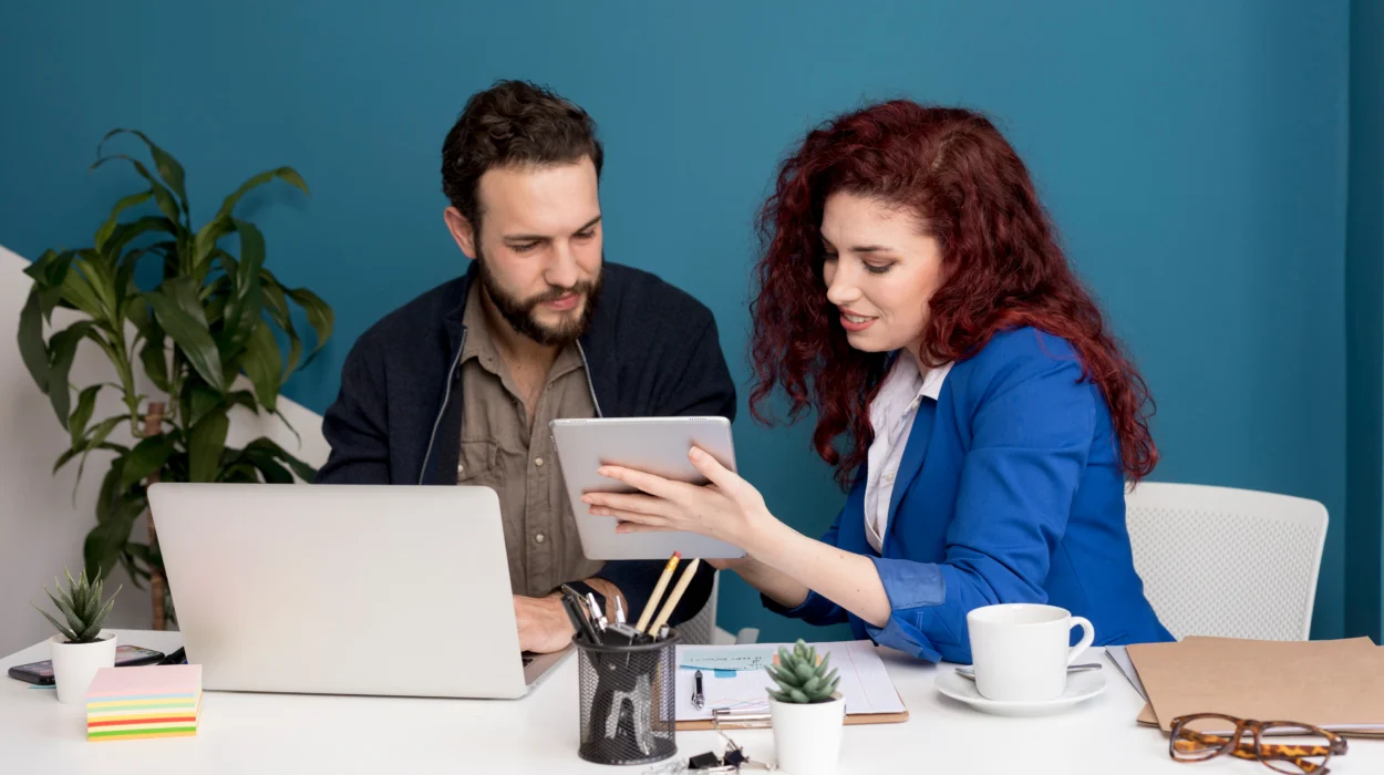 Business owner reviewing VAT registration form with accountant