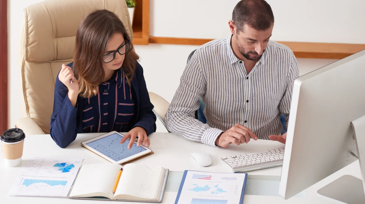 Disorganised receipts and documents on desk with frustrated business owner